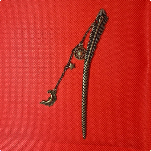 Metal bookmark in a Feather Style